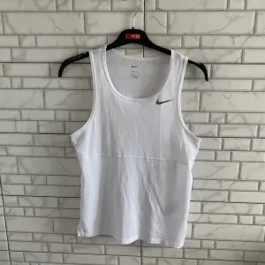 Жіночі спортивні футболки,майки  Nike,Puma,Adidas,Reebok