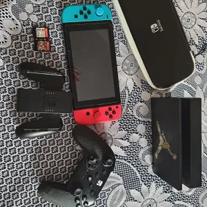 Ігровий комплект Nintendo Switch v2 іграми (Mario Kart + LEGO) та аксесуарами