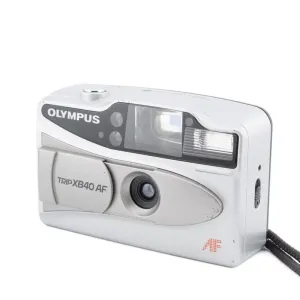 Olympus trip xb40 - японский маленький компакт, потертості