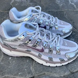 Жіночі кросівки Nike P-6000 Platinum Violet Vast Grey 36-41.