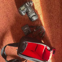 Дзеркальний фотоапарат Nikon D7000 + об'єктив + сумка