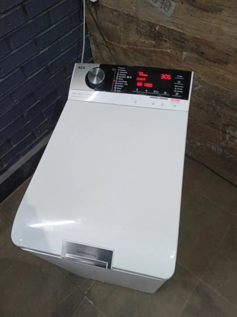 Вертикальная стиральная/пральна машина AEG Lavamat 7000 series