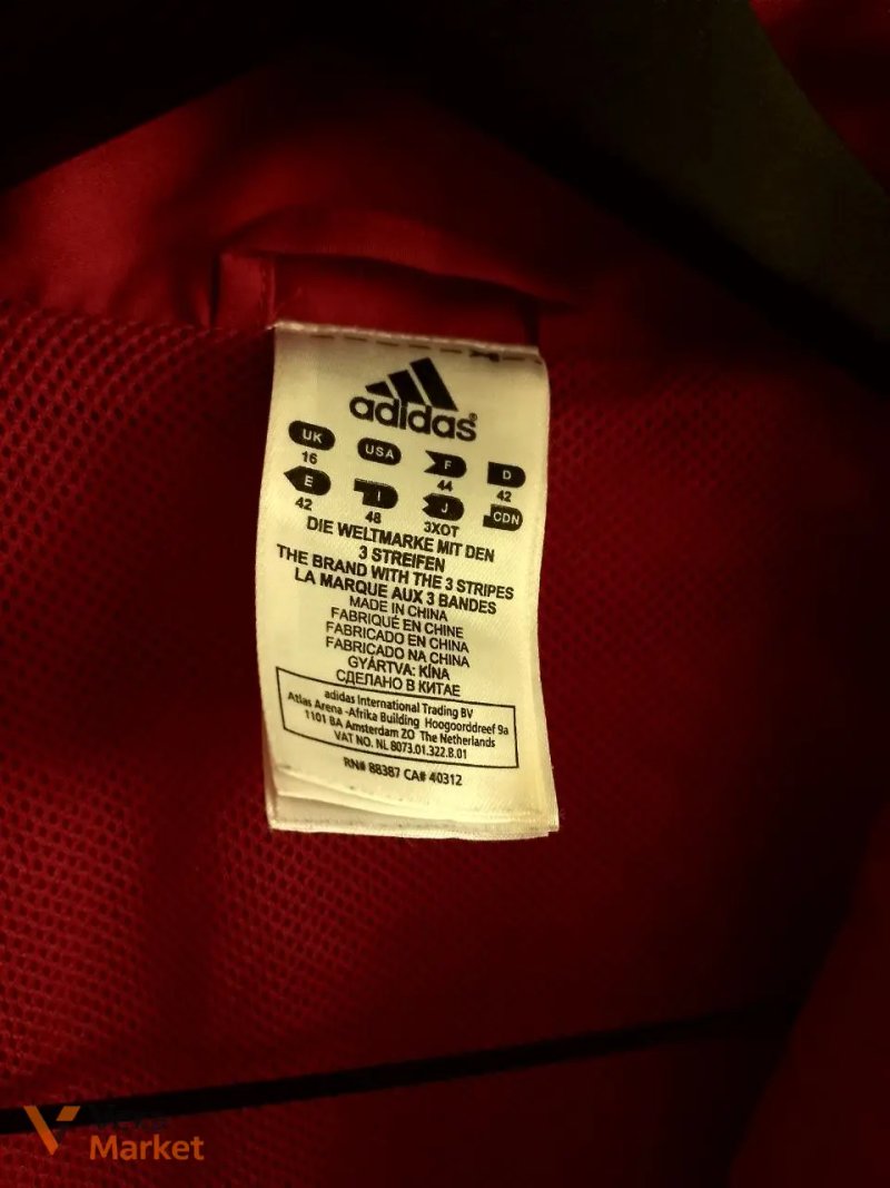 Жіноча спортивна вітрівка Adidas р. 48 Л — фото 3