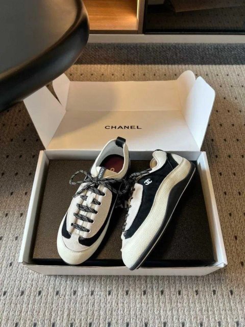 Жіночі кросівки Chanel 26SS чорно-білі шкіряні в стилі ретро натуральна шкіра 39 р