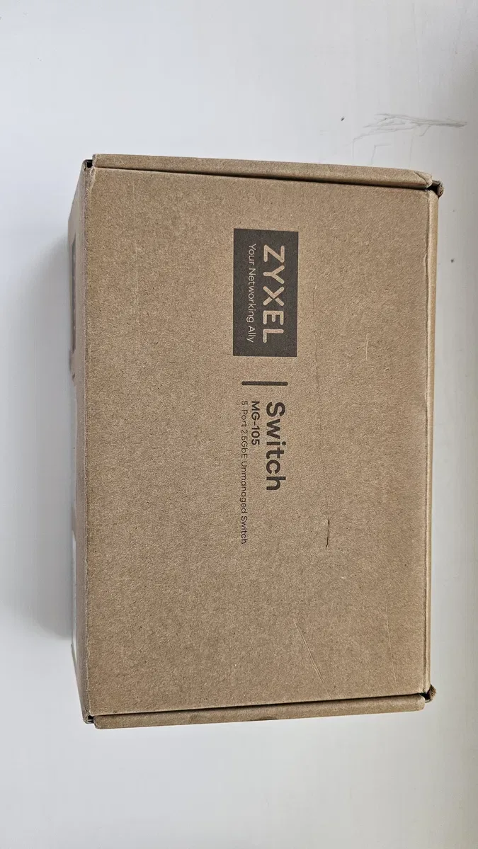 Комутатор Zyxel MG-105 (Zyxel Switch MG-105) та Нова бездротова точка доступу Zyxel Wireless LAN Zyxel NWA50AX. — фото 2