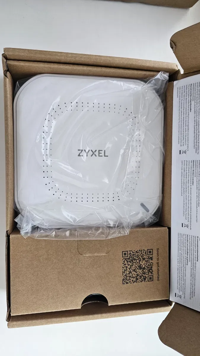 Комутатор Zyxel MG-105 (Zyxel Switch MG-105) та Нова бездротова точка доступу Zyxel Wireless LAN Zyxel NWA50AX. — фото 6