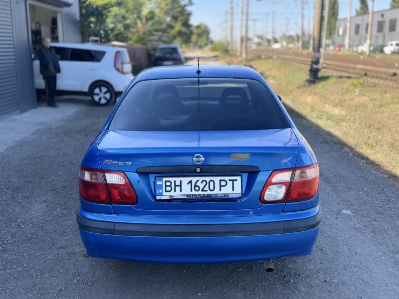 Nissan Almera 1.5 газ/бензин — фото 4