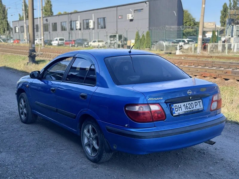 Nissan Almera 1.5 газ/бензин — фото 6