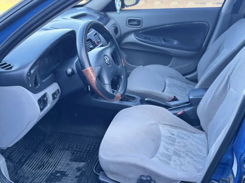 Nissan Almera 1.5 газ/бензин — фото 8