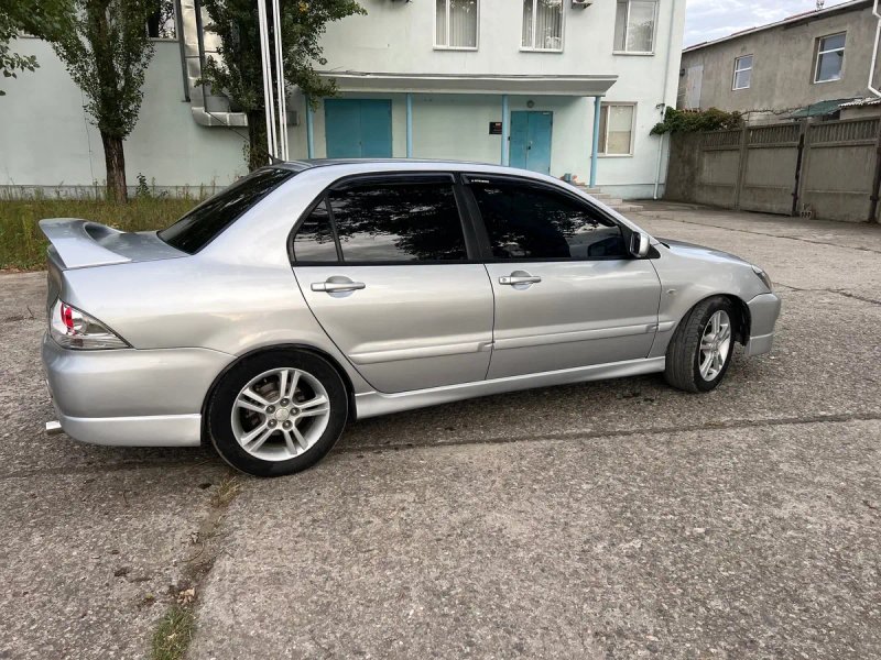 Продам Mitsubishi Lancer 2.0 спорт — фото 7