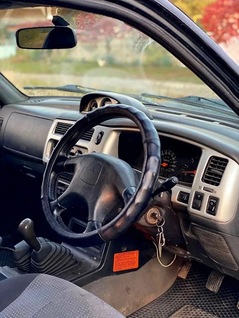 Продається Mitsubishi L200  повний привід понижайки все працює мотор 2,5 тді,в відміниму стані (2005 рік) — надійний та невбиваемий  рамний пікап ! — фото 6