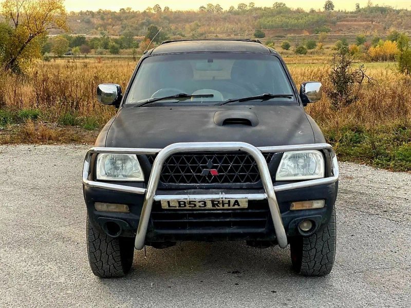 Продається Mitsubishi L200  повний привід понижайки все працює мотор 2,5 тді,в відміниму стані (2005 рік) — надійний та невбиваемий  рамний пікап ! — фото 7