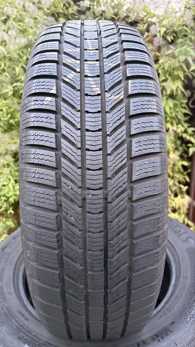 Шини зимові 215/65 r17 Continental 22 рік ціна за комплект — фото 2