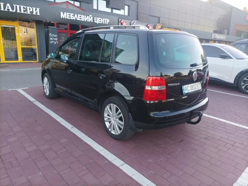 Volkswagen Touran   2.0 tdi — фото 7